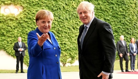 德国总理默克尔会见英国首相约翰逊。