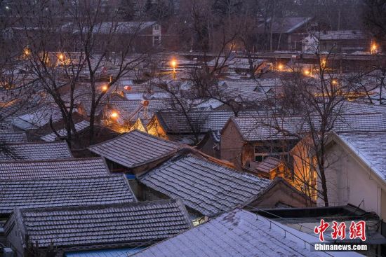1月19日，北京迎来降雪天气。图片来源：视觉中国